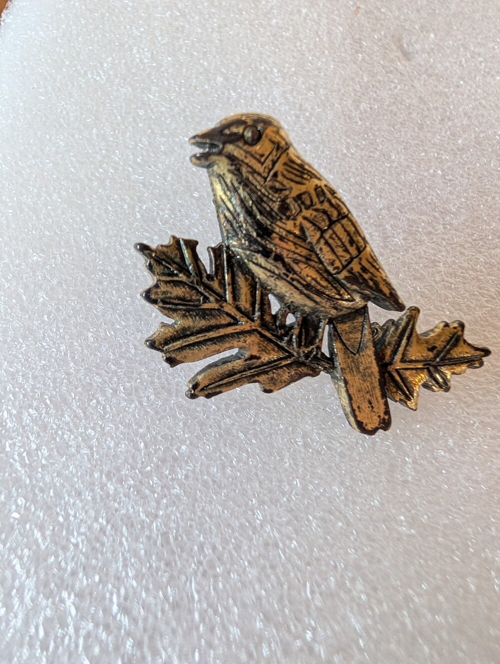 Vintage Brass Tone Bird Brooch with Leaf Accent